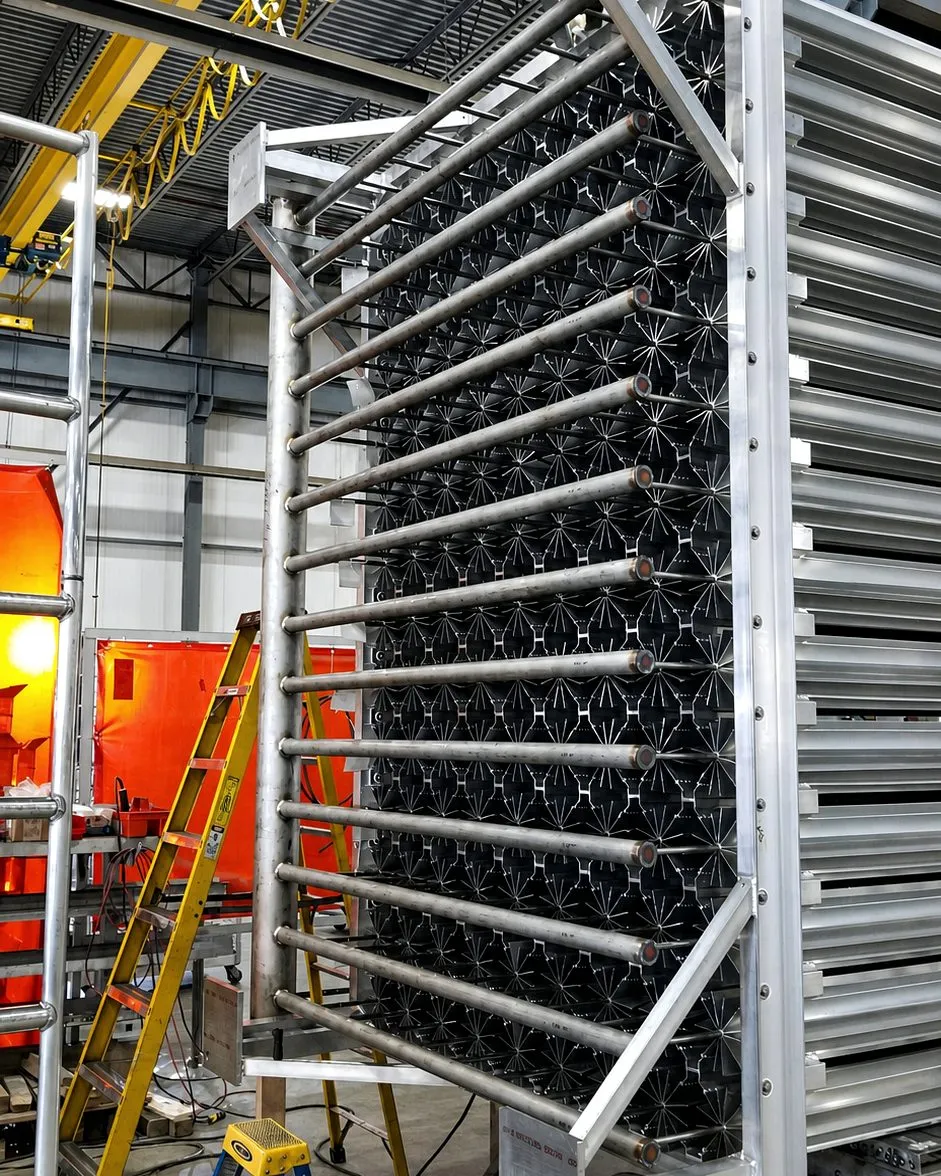 An array of finished FWM AV Series vaporizer units staged together on the shop floor