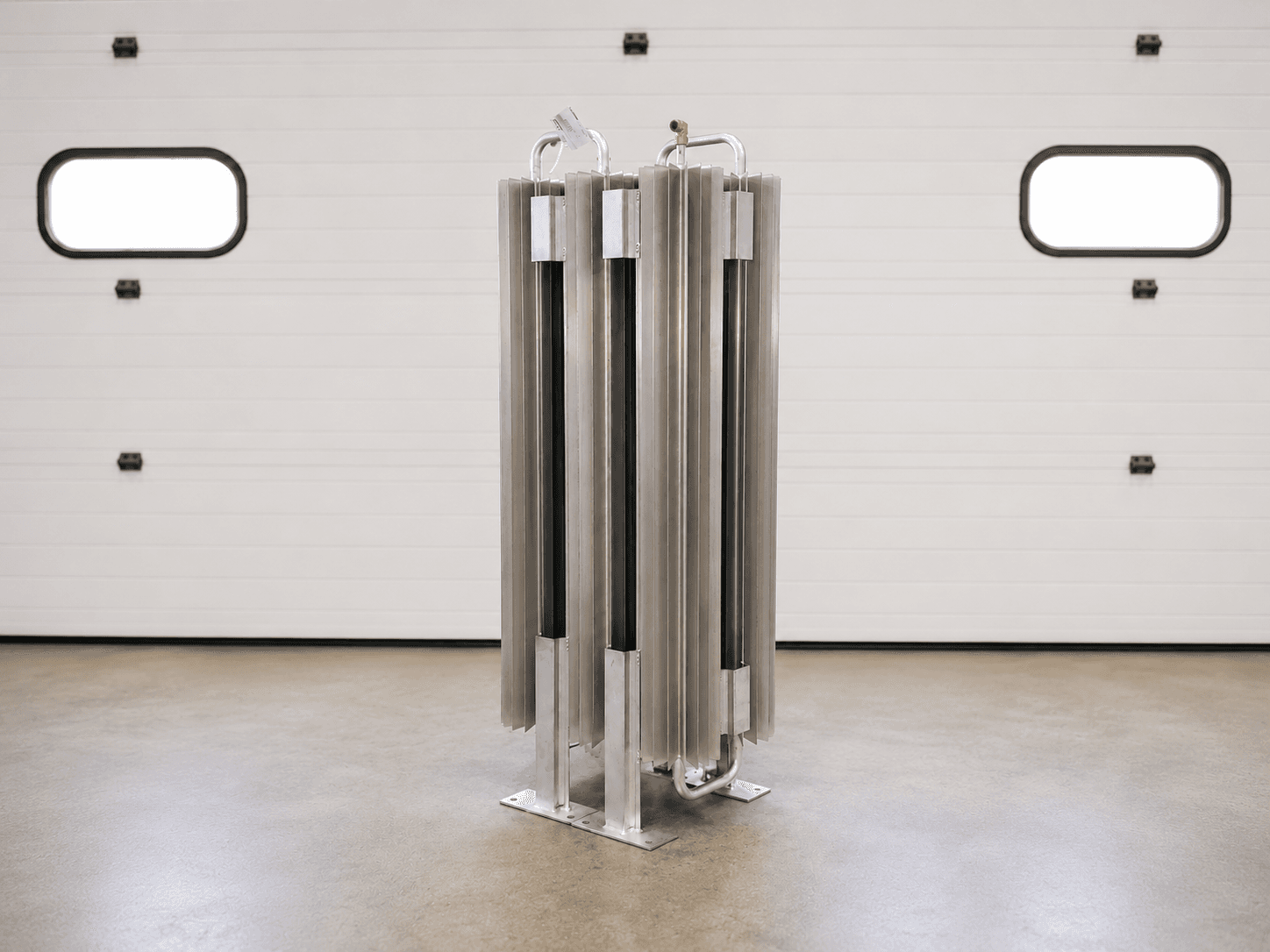 FWM DVAP liquid cylinder and Dewar ambient air vaporizer on its bolt-down skid