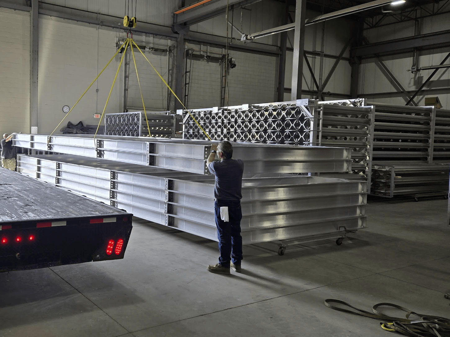 Large welded aluminum support frames staged for shipment from the FWM manufacturing floor