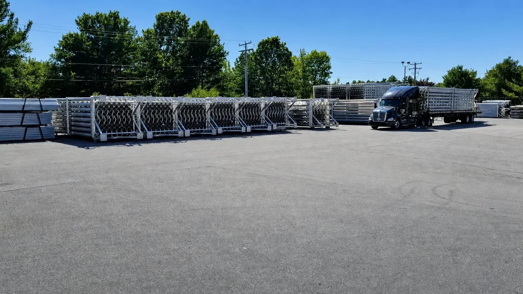 Dozens of finished FWM vaporizers staged across the outdoor yard
